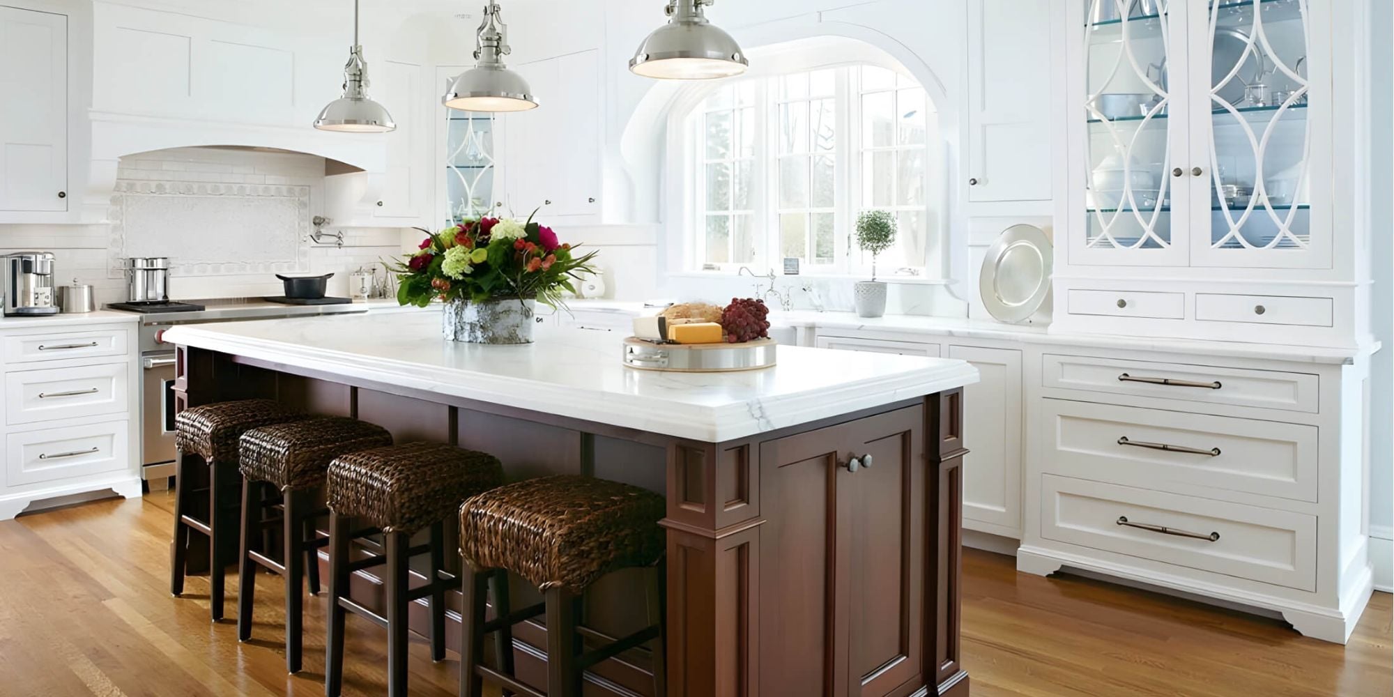 Custom kitchen in a New Canaan custom home with a large island with seating and custom cabinetry by TR Design-Build