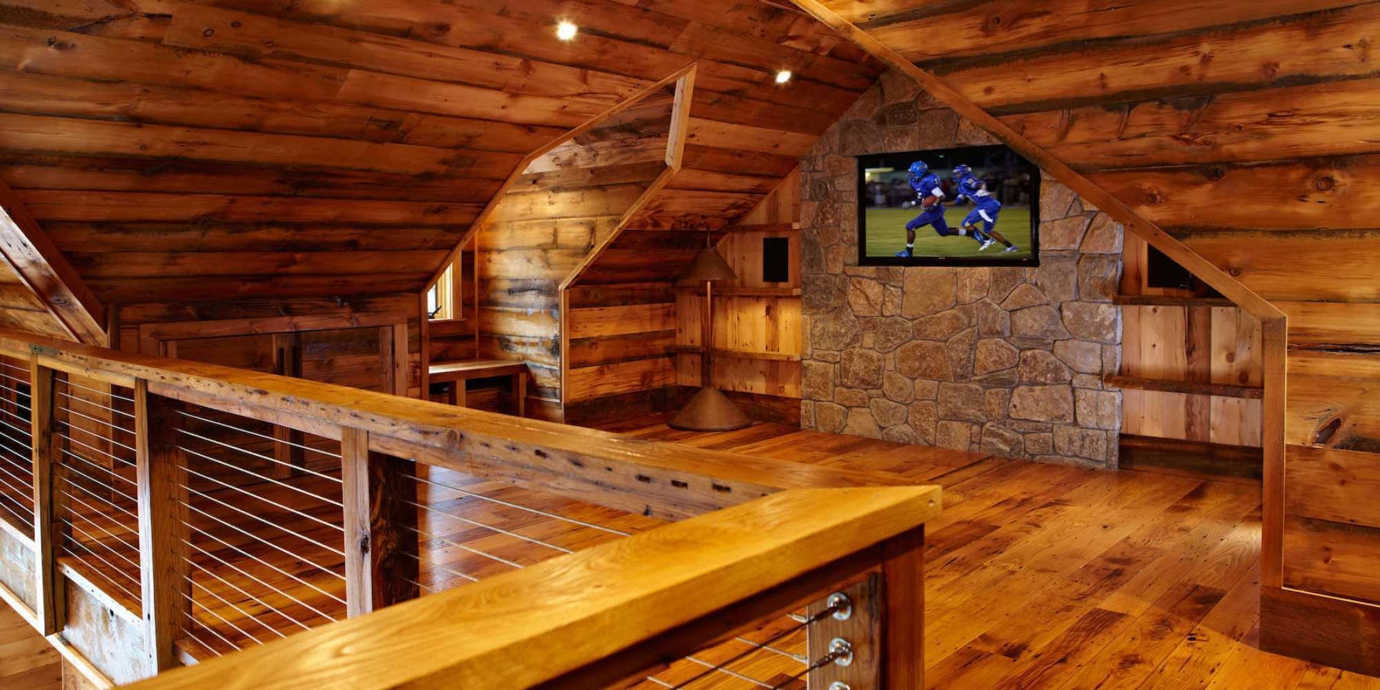 A custom garage workshop addition with a natural wood interior by TR Design-Build
