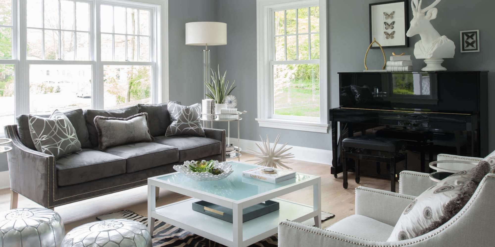A living room addition filled with natural light by TR Design-Build