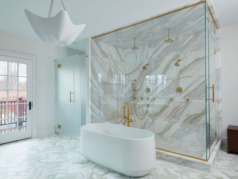 Modern bright bathroom in a new custom home by TR Design Build in New Canaan, CT
