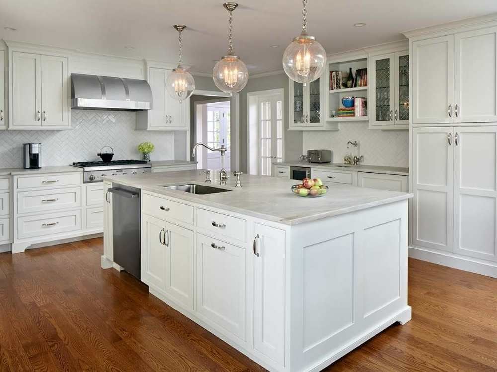 An open-concept kitchen remodel in Fairfield, CT whole home remodel with a large island and custom millwork by TR Design-Build An open-concept kitchen remodel in Fairfield, CT whole home remodel with a large island and custom millwork by TR Design-Build