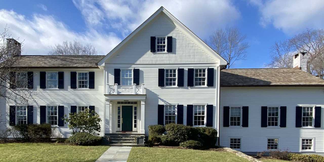 A large custom home addition in New Canaan by TR Design-Build
