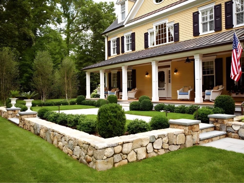 TR Design Build home exterior with classic architecture and formal garden in Darien, CT