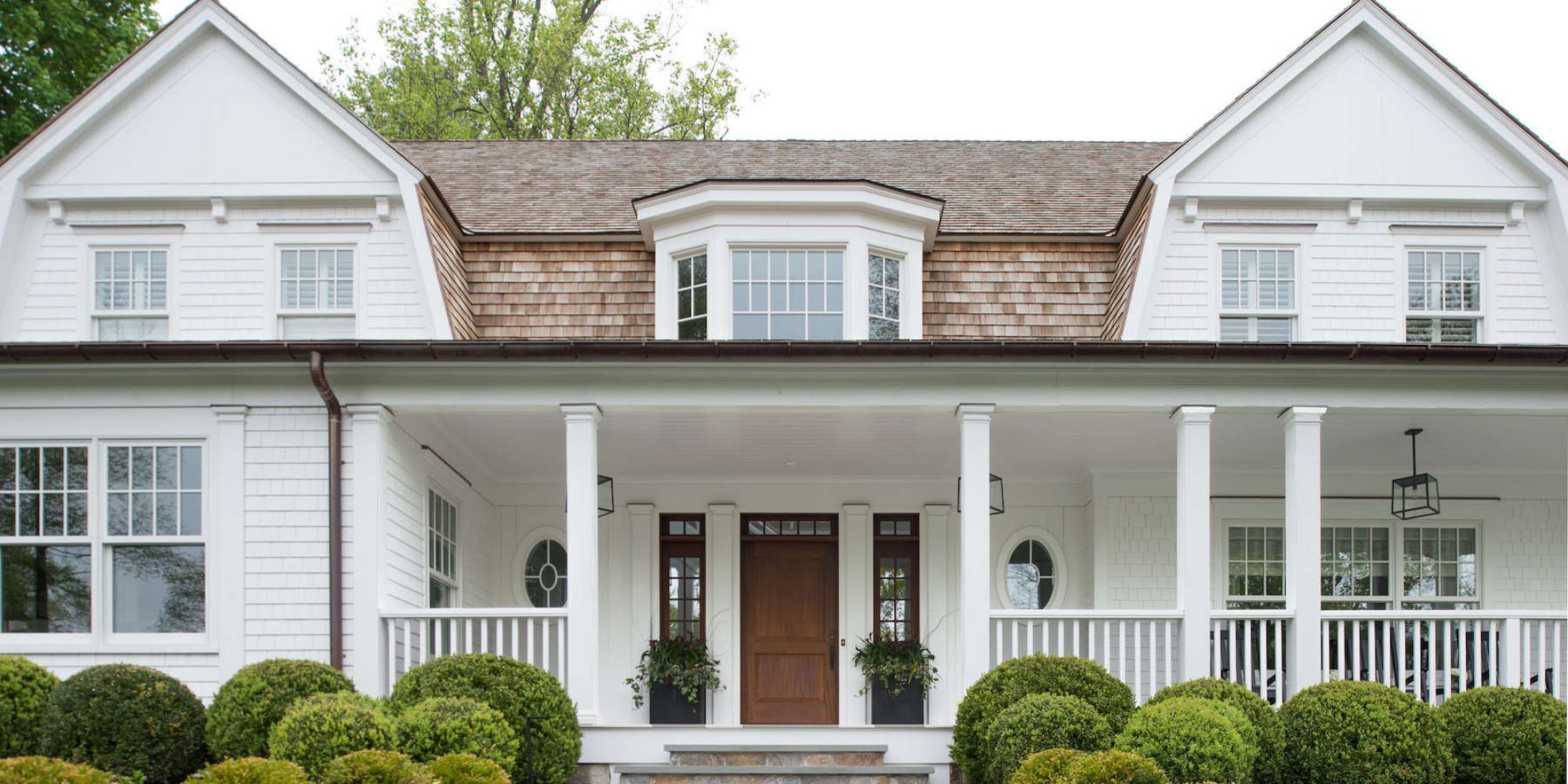 Front porch and exterior of a remodeled home by TR Design Build in New Canaan, CT