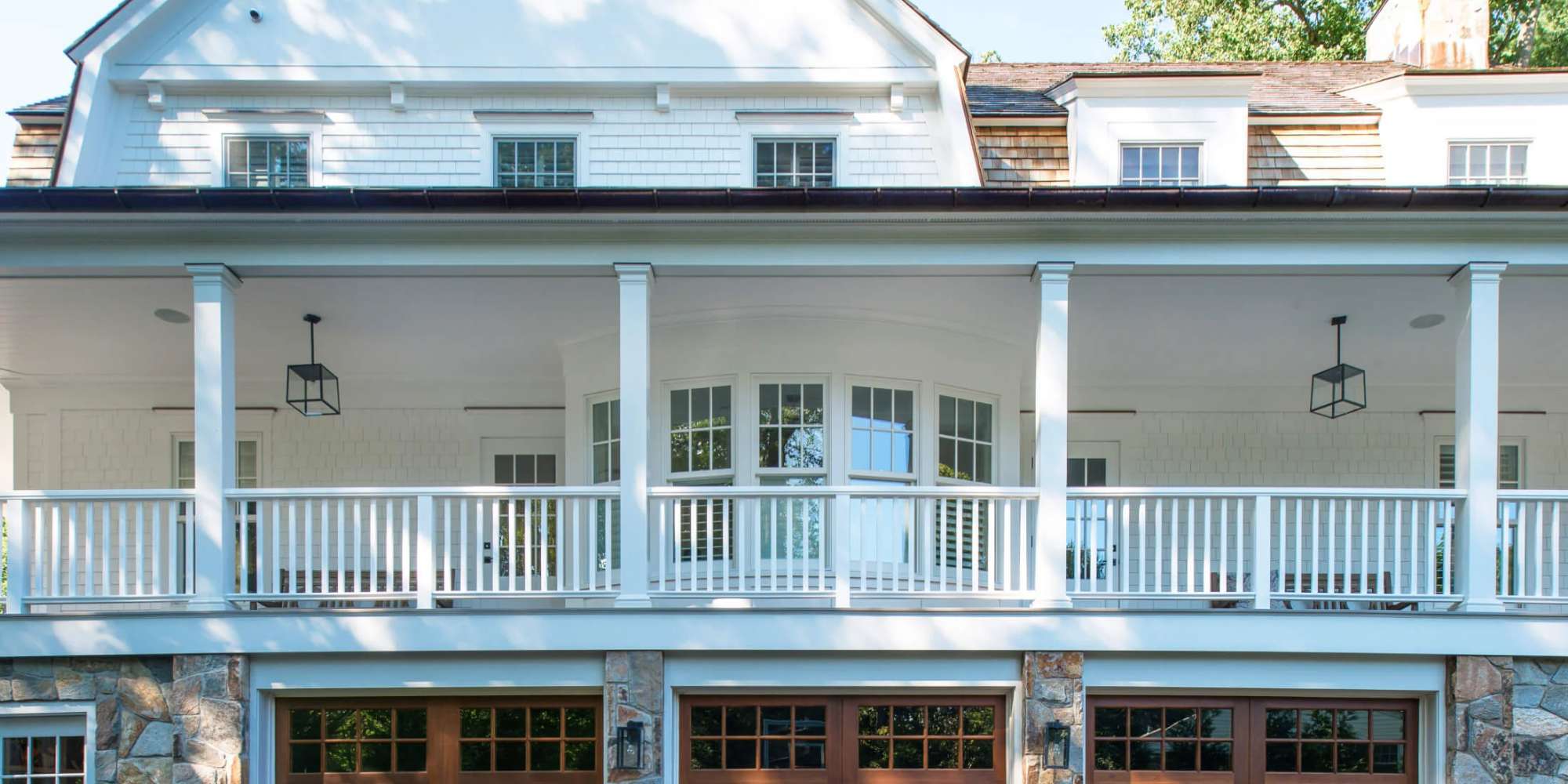 Custom home with three car garage, second level patio in Norwalk, CT by TR Design Build